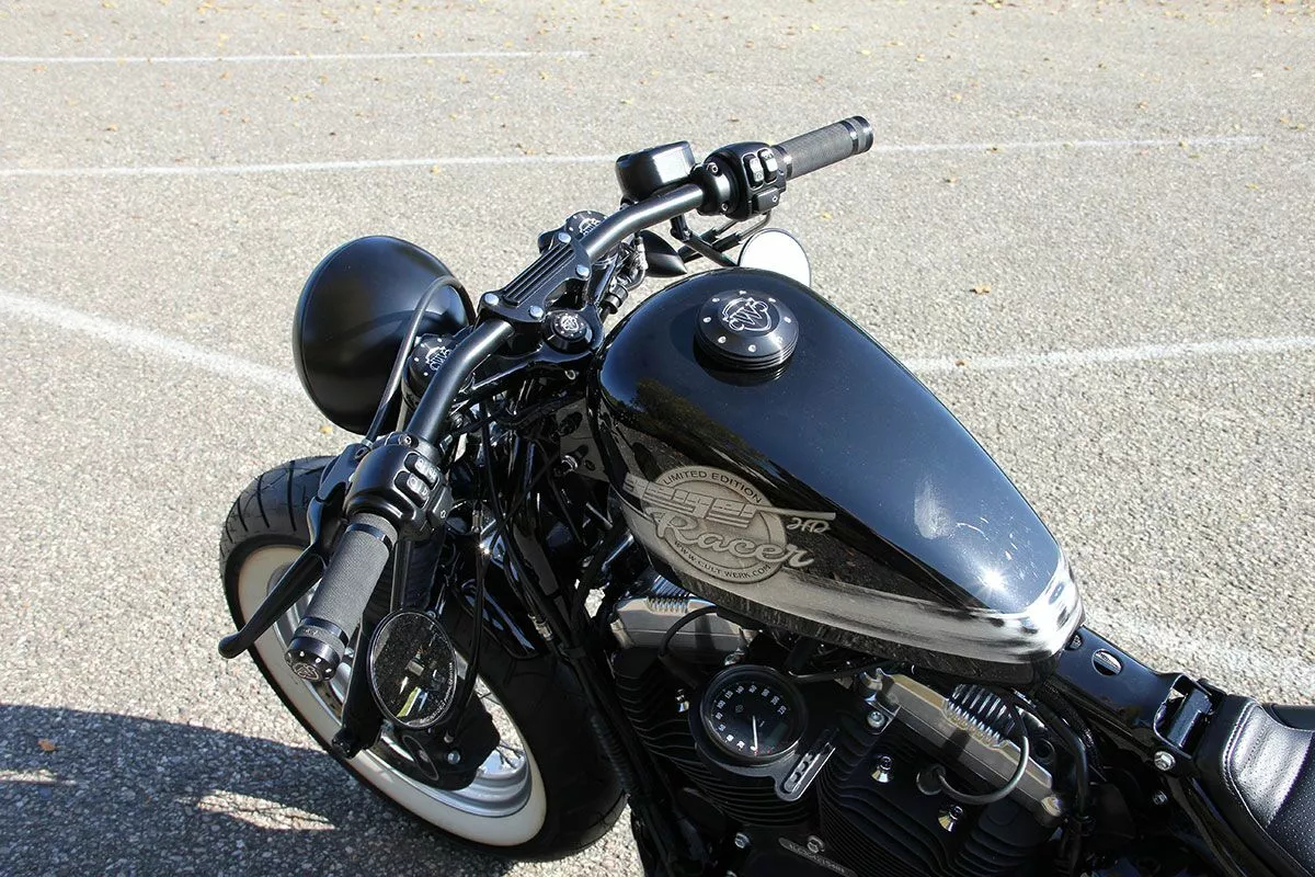 Затиск керма для Harley Sportster